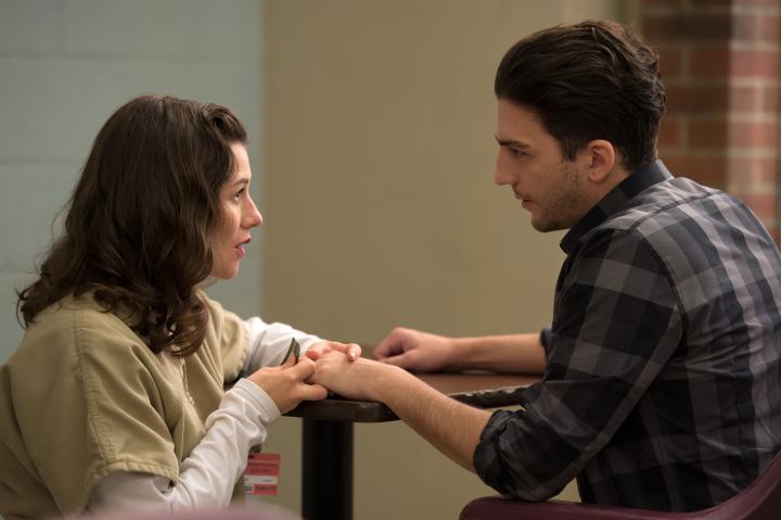 Yael Stone and John Magaro in Orange Is the New Black (2013)