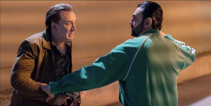 Nicolas Cage and Mohamed Karim in A Score to Settle (2019)