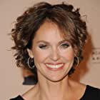 Amy Brenneman به عنوان Rachel