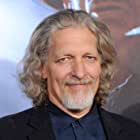 Clancy Brown به عنوان Isaac
