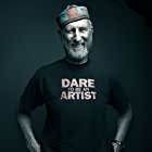 James Cromwell به عنوان Warden Hal Moores