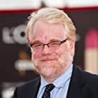 Philip Seymour Hoffman به عنوان Plutarch Heavensbee