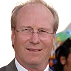 William Hurt به عنوان Secretary of State Thaddeus Ross