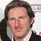 Adrian Dunbar به عنوان Patrick Brontë