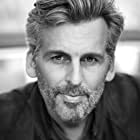 Oded Fehr به عنوان Carlos Olivera