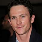 Jonathan Tucker به عنوان Alex