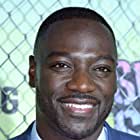 Adewale Akinnuoye-Agbaje به عنوان Dave Duerson