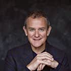 Hugh Bonneville به عنوان Mr. Delacroix