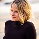 Joelle Carter به عنوان Principal Kim Collins