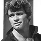 Martin Kove به عنوان John Kreese