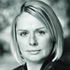Heather Craney به عنوان Debbie - Clerk of the Court