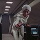 Heather Downham به عنوان Stewardess