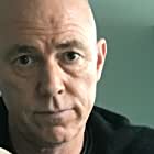 Michael Gaston به عنوان Holiday