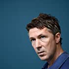 Aidan Gillen به عنوان Janson