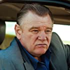 Brendan Gleeson به عنوان Tom Nickerson