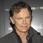 Bruce Greenwood به عنوان Dr. John