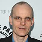 Zeljko Ivanek به عنوان Canadian Guy