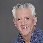 Gregory Jbara به عنوان Chairman Magnuson