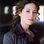 Elizabeth Rodriguez به عنوان Detective Romsey