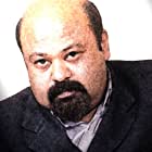 Saurabh Shukla به عنوان Rameshwar Singh 'Tauji'