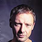 John Simm به عنوان Rhys