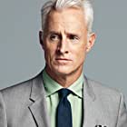 John Slattery به عنوان Dennis