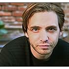 Aaron Stanford به عنوان Skeemo