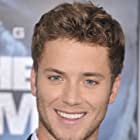 Jeremy Sumpter به عنوان Young Sam 'Shooter' Green