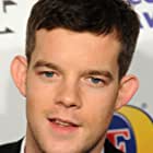 Russell Tovey به عنوان Billy Brooks