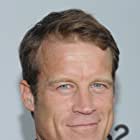 Mark Valley به عنوان John Scott