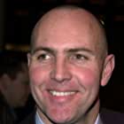 Arnold Vosloo به عنوان Tom Jedd