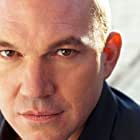 Wade Williams به عنوان Brad Bellick