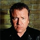 Ray Winstone به عنوان 'Mac' George Michale