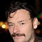 Julian Barratt به عنوان Stash