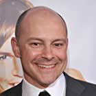 Rob Corddry به عنوان John Mese