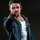 Jesse Hutch به عنوان Agent Russel Tavaroff