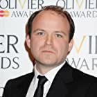 Rory Kinnear به عنوان Admiral Chauncey Badminton