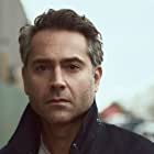 Omar Metwally به عنوان Agent Santiago