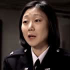 Seo-hie Ko به عنوان Officer Kwon Kwi-ok