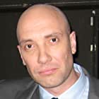 Zachary Baharov به عنوان Interrogator