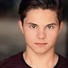 Zach Callison به عنوان Robin