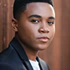 Chosen Jacobs به عنوان Young Mike Hanlon